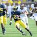 Michigan defensive back Raymon Taylor runs the ball after intercepting a Central Michigan pass during the first half at Michigan Stadium on Saturday, August 31, 2013. Melanie Maxwell | AnnArbor.com